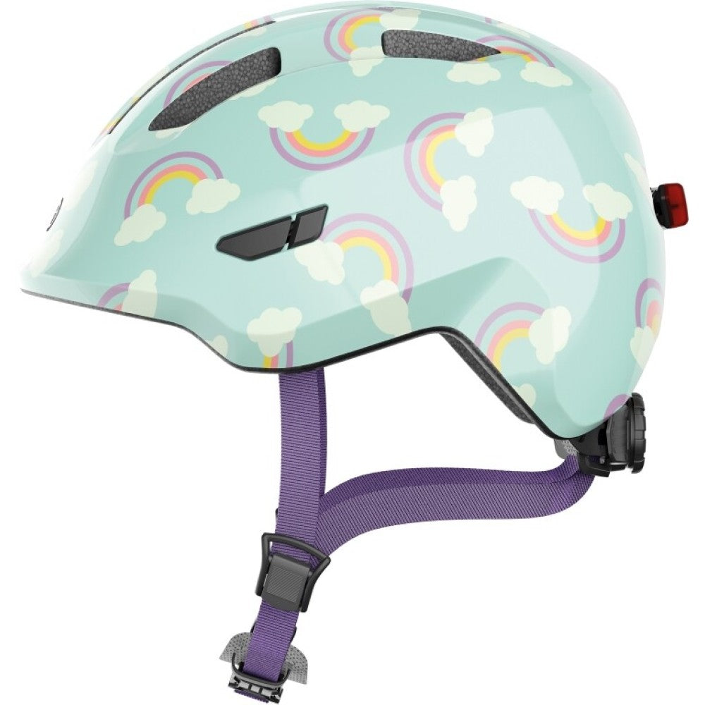 Abus Smiley 3.0 i regnbue-design. Smart, sikker og komfortabel cykelhjelm til børn. Fås i 2 størrelser. Kvalitet og sikkerhed fra verdenskendte tyske Abus